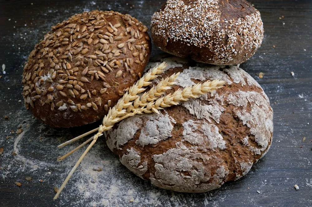 Fresh-baked seeded bread, cooling on the counter